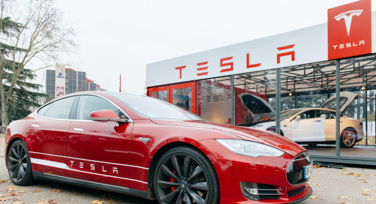 Tesla Slides As Top Holder Reduces Stake; Merrill Lynch Sees 23% Upside