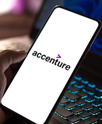 Accenture upgraded to Buy from Hold at Edward Jones