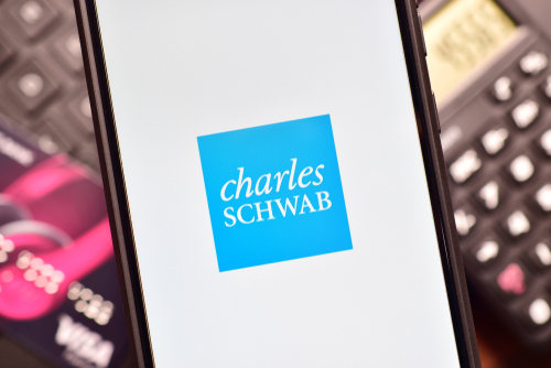Schwab stock hit in bank mess, investors should be cautious, Barron’s says