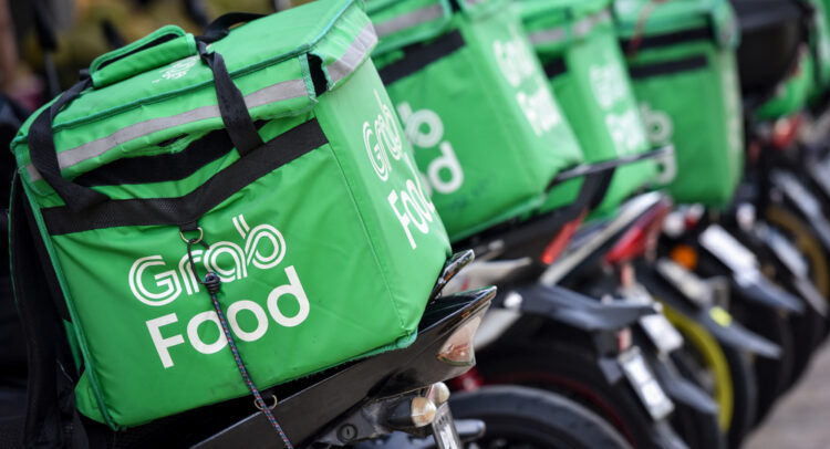 M & A News: Grab (NASDAQ:GRAB) and GoTo Rekindle Merger Talks