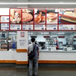 Costco (NASDAQ:COST) Shares Slip, But Hot Dog Prices Are Safe