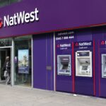 NatWest Repurchases £1B Shares as UK Reduces Stake