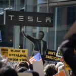 Tesla Stock Caught in a Swath of Vandalism Protests and Record-High Trade-Ins