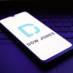Dow Jones Climbs as Market Braces for Powell Speech